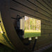 Close-up of the electrical connection box on the Ula Mini 2-person outdoor sauna, showing modern outdoor wiring setup.