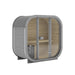 Grey Ula Mini 2-person outdoor sauna featuring a sleek contemporary design with light interior and rounded glass front.