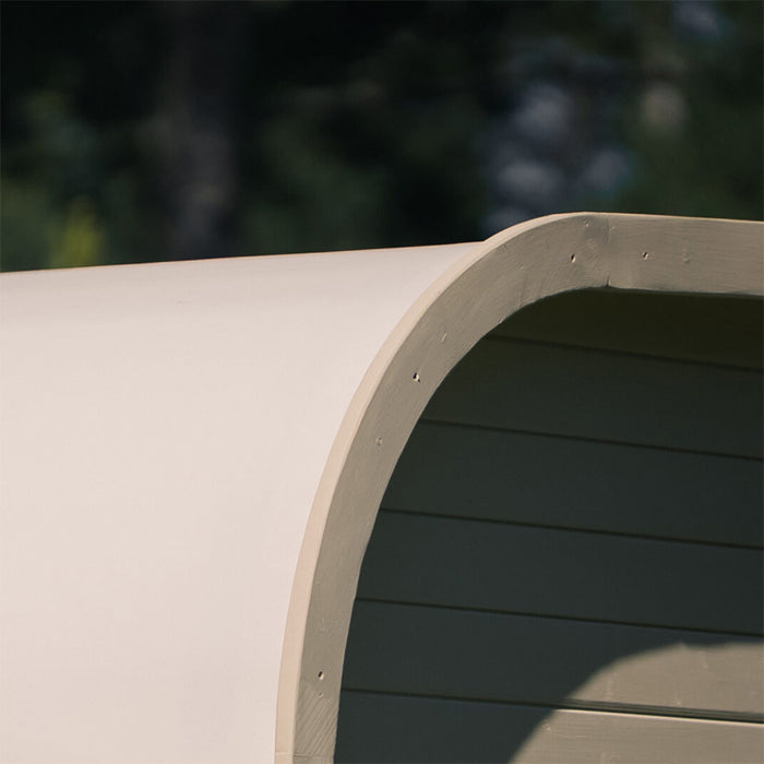 Detailed view of the rounded roof edge of the white Ula Mini 2-person outdoor sauna.