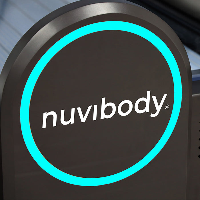 Close-up of the illuminated Nuvibody logo on the side panel of the PRO red light therapy bed, emphasising brand quality.