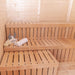 A cosy sauna bench inside the Garden Cube 3 x 8m, showcasing a natural wood finish, complete with towels and sauna essentials for a relaxing experience.