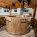 Hot Tub from Thermowood under a wooden shelter.