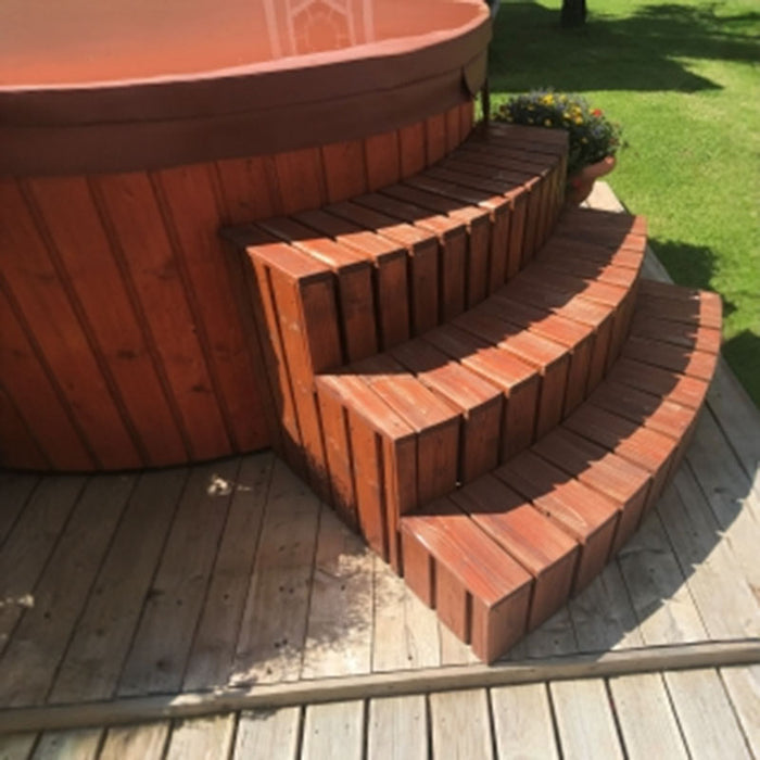 Three-step wooden access stairs for the hot tub.