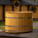 Oval cold tub made from spruce with a wooden lid.