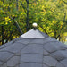 Close-up of the Pavilion 10m² Sun’s black bitumen roof shingles, complete with a decorative golden ball, showcasing its durable and stylish design.