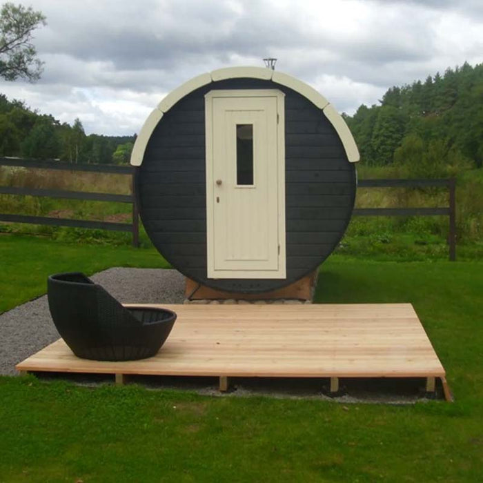 Traditional Sauna Barrel 2.2 x 4m view with a single modern chair outside.