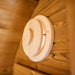 Close-up view of light in Sauna Barrel from Thermowood.