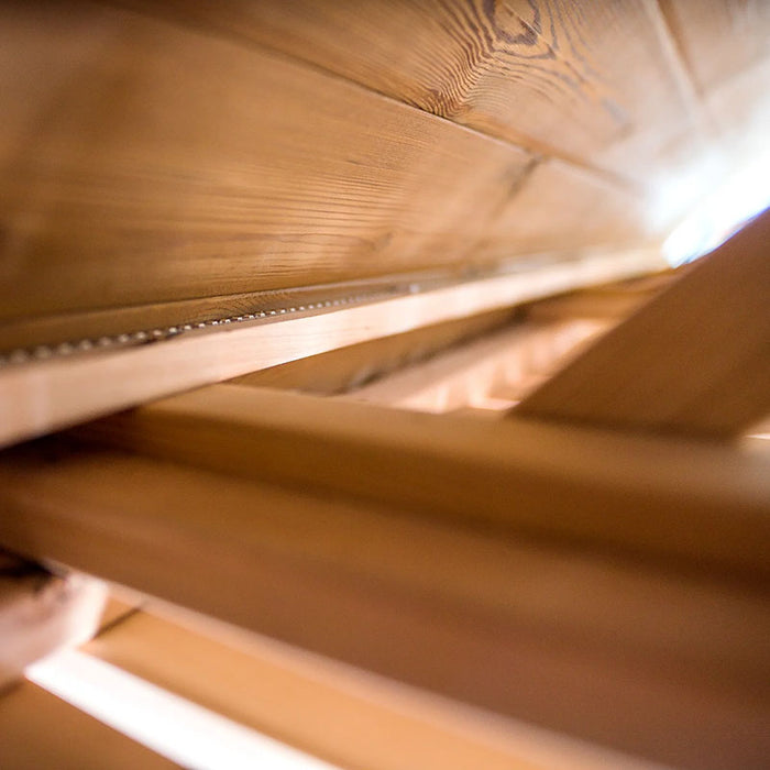 Close-up view of wood with LED strips in Sauna Barrel from Thermowood.