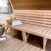 Close-up view of Sauna Barrel from Thermowood with bucket and towel.