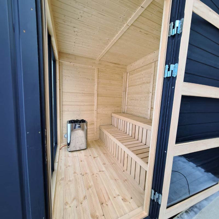 Traditional Sauna Cube with sleek backrests and benches made from deciduous wood.