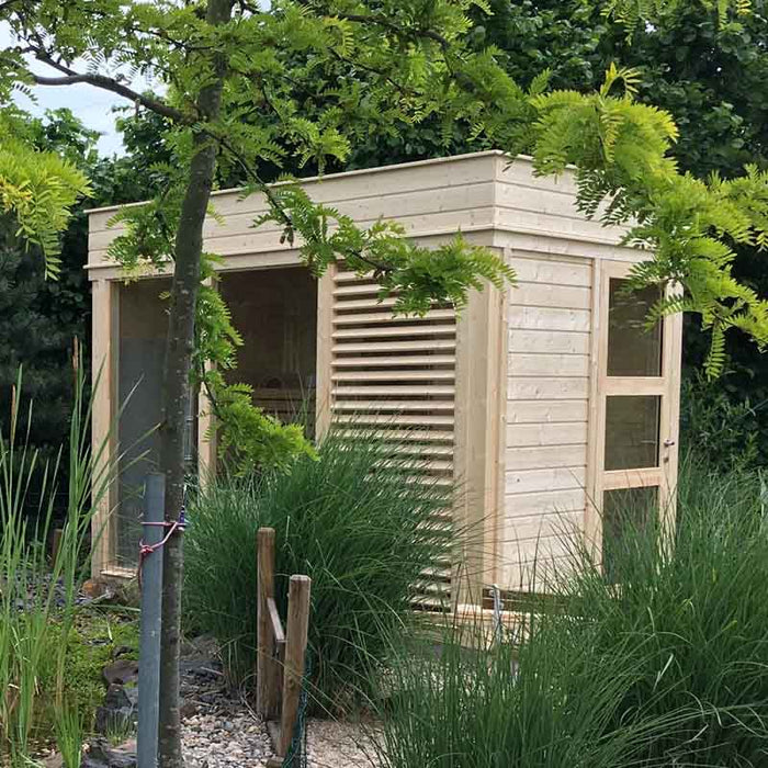 Elegant traditional sauna cube, featuring a door and window for easy access.