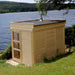  Cosy traditional sauna cube by the water, perfect for a peaceful getaway.