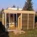 Traditional Sauna Cube 3 x 4m with Lounge installed outdoors.