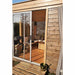 Close-up view of main entrance to the Viking Industrier Traditional Sauna Cube with wooden interior. 