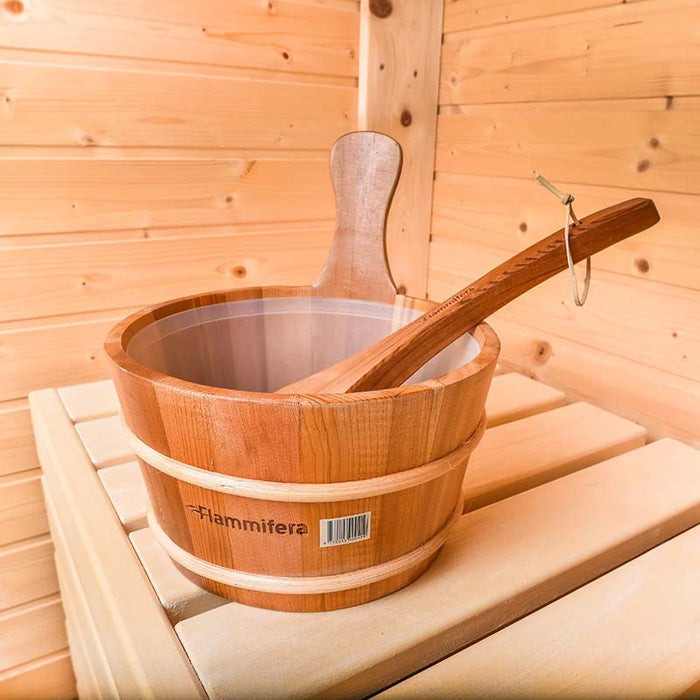 Wooden bucket inside the Traditional Sauna Cube 3 x 4m with Lounge.