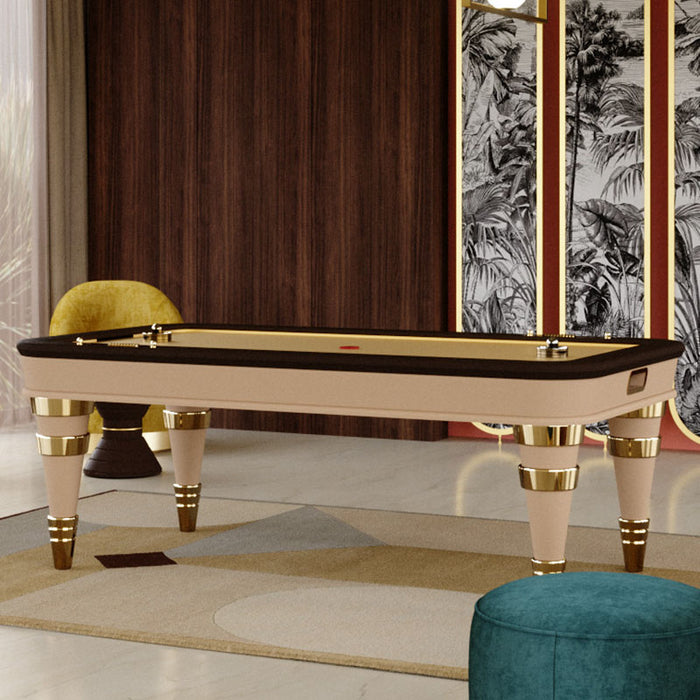 Stylish Vismara Arya air hockey table in a designer lounge with geometric rug, statement lighting and bold art panels.