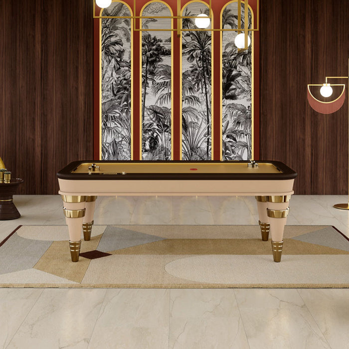 Luxury Vismara Arya air hockey table in an opulent games room with golden accents, modern decor and velvet seating – elegant entertainment furniture.