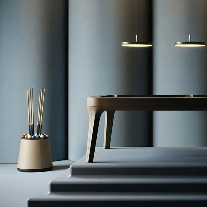 Vismara Bobo Cue Rack and luxury pool table set on a raised platform with modern pendant lights in a moody, designer interior.