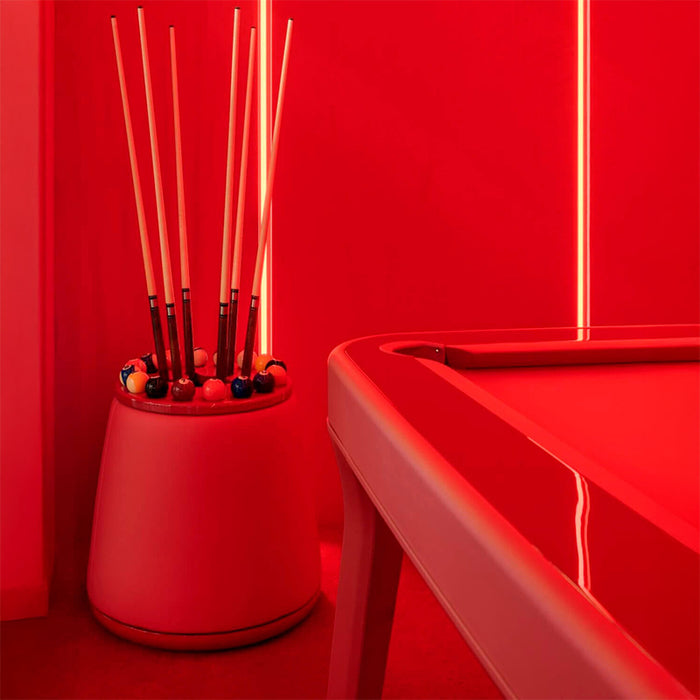 Striking red interior with the Vismara Bobo Cue Rack and modern pool table, illuminated by dramatic LED lighting for a bold aesthetic.