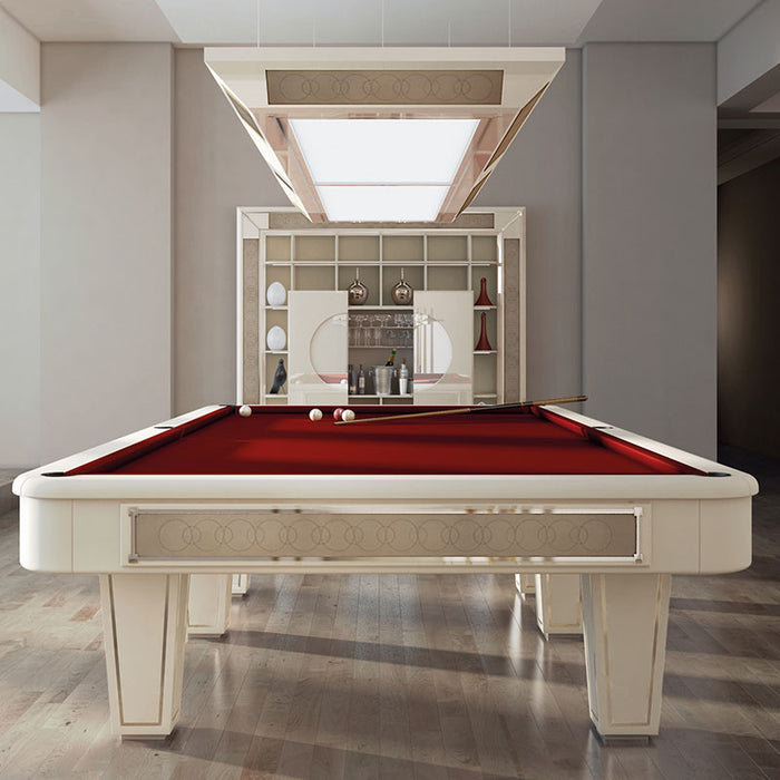 Vismara Desire pool table with red cloth in a luxury home bar setting, featuring modern shelving and elegant décor for premium billiards experience.
