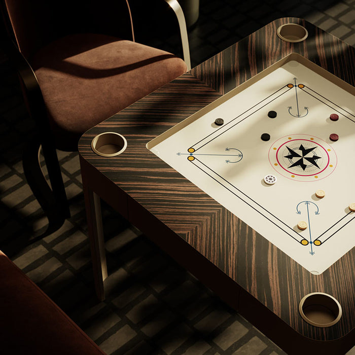 Vismara Enigma game table set up for carrom with sleek dark wood accents, smooth striker zones, and integrated cup holders – modern luxury indoor gaming.
