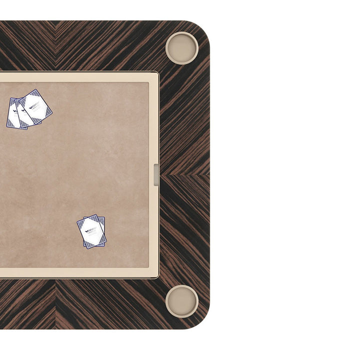 Top-down view of the Vismara Enigma game table set up for card games, with a soft suede-like play surface and integrated cup holders – stylish tabletop for social gaming.