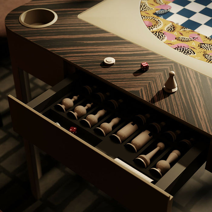 Close-up of Vismara Enigma game table featuring a drawer with neatly stored wooden chess pieces and a colourful chess board – luxury multifunctional board game table.
