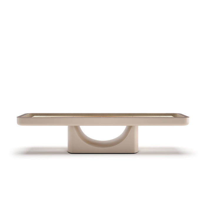Studio image of the Vismara Flume Shuffleboard Table with cream lacquered finish, curved base, and minimalist silhouette – elegant centrepiece for premium entertainment rooms.