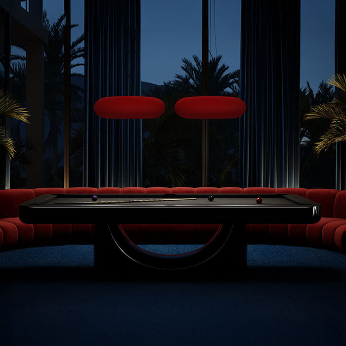 Stylishly displayed Mono Pool Table with a carbon fibre base, creating an exquisite focal point in a lounge setting.