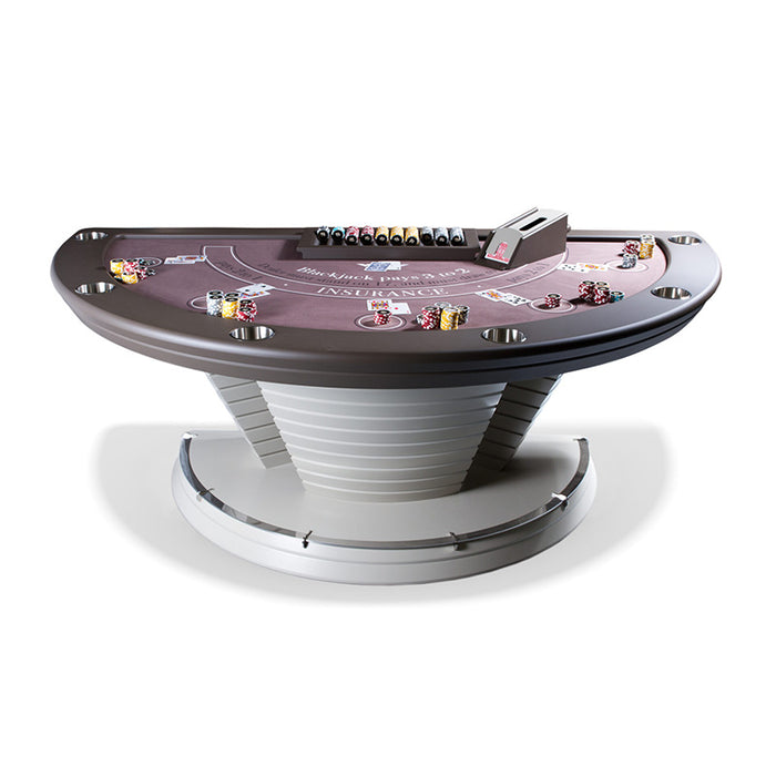 Vismara Napoleon Blackjack Table with a contemporary tiered base and dark brown playing surface, styled with premium casino chips and professional card shuffler for luxury game nights.