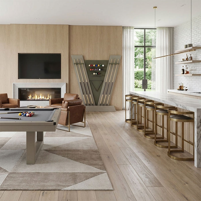 Vismara Newde Cue Rack displayed in a contemporary open-plan living space with pool table, fireplace, and marble kitchen bar.