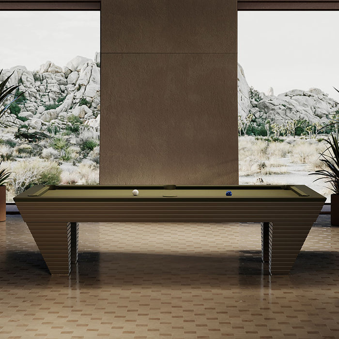 The elegant green-cloth Vismara Newde Pool Table framed by natural light and cosy decor, creating a relaxing and stylish atmosphere.