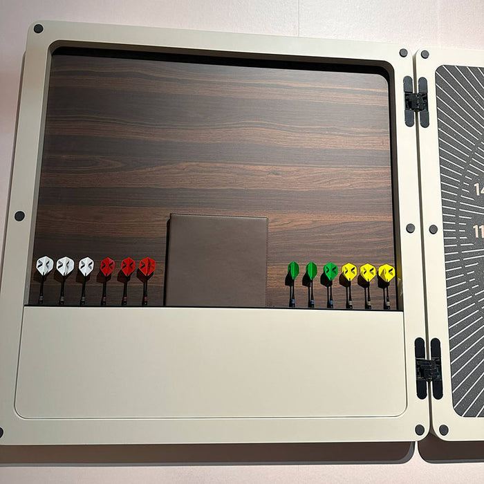 Close‑up view of the Vismara Nido Dartboard Cabinet interior showing neatly stored darts against a warm wood‑grain back panel and integrated storage compartments.