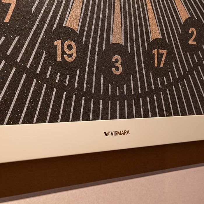 Close‑up detail of the Vismara Nido Dartboard Cabinet dartboard panel showing textured scoring surface with visible Vismara logo and design accents.