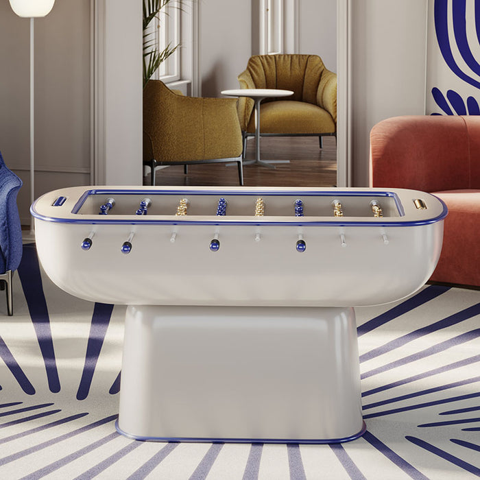 Oskar Foosball Table in a retro-modern game room, styled with vibrant furniture and bold decor.