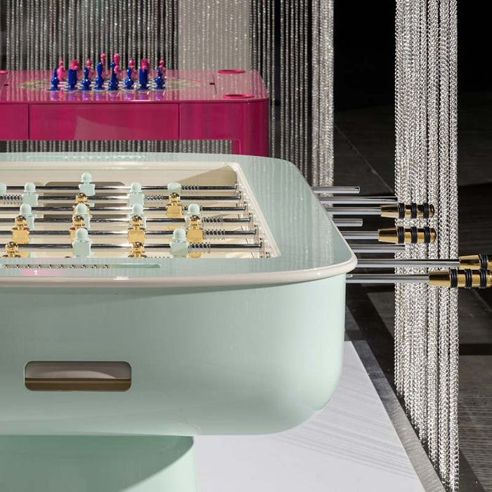 Mint-green Oskar Foosball Tables, displayed side by side to highlight customisable finishes.