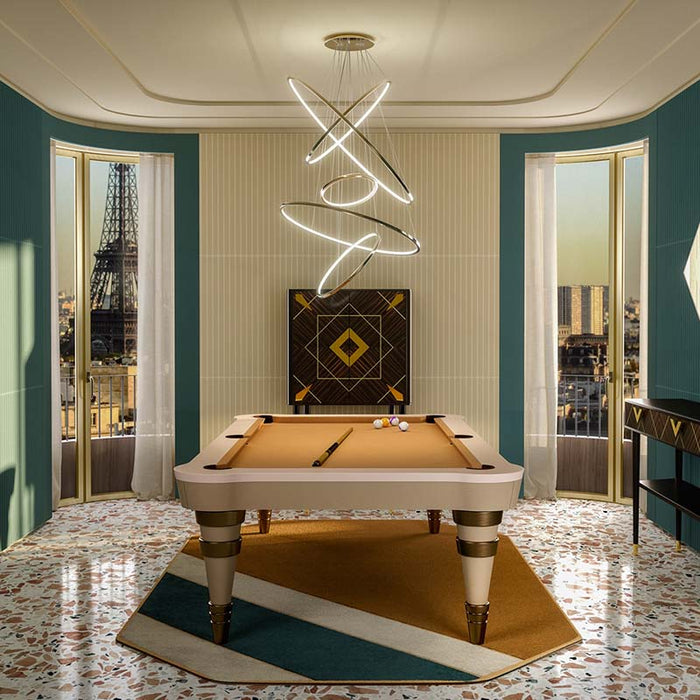 The Vismara Regis Pool Table styled with a tan playing cloth, perfectly placed in a sophisticated room with a view of the Eiffel Tower.