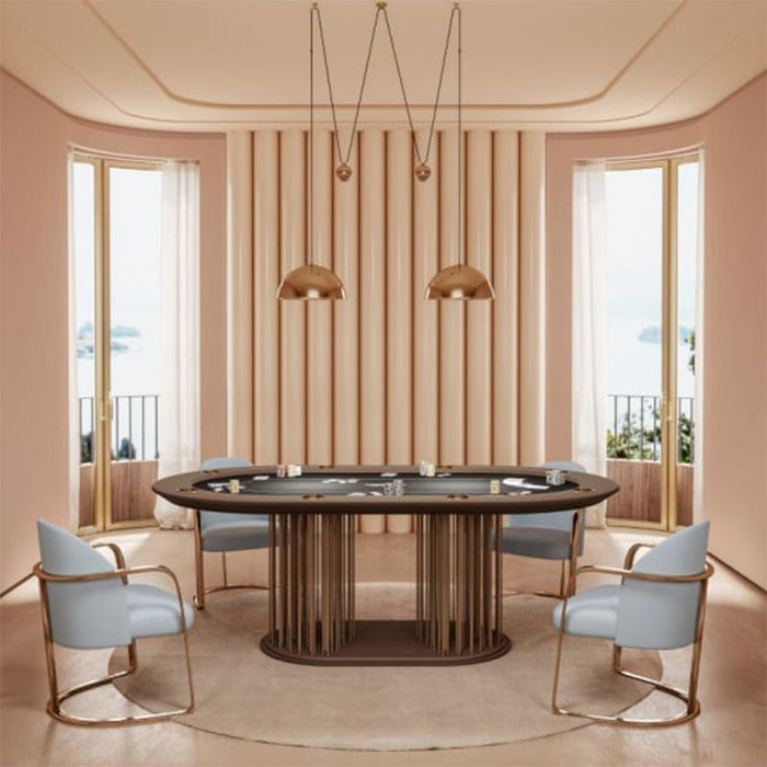 Elegant Vismara Shanghai Poker Table in a soft pink luxury interior, featuring sleek gold accents and pale blue leather chairs, ideal for sophisticated home entertainment.
