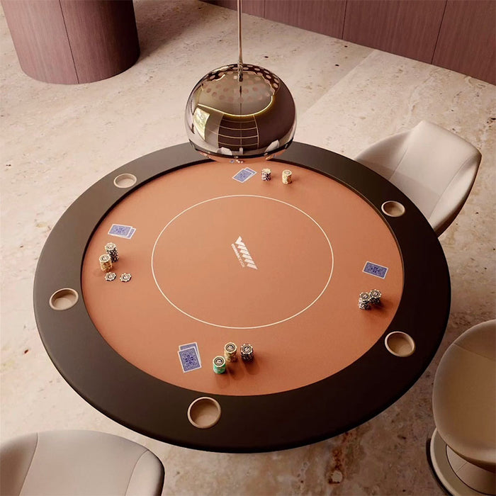 Top-down view of the Vismara Shanghai round poker table, showcasing the terracotta felt surface, chip holders, and precision-placed poker accessories in a modern interior.