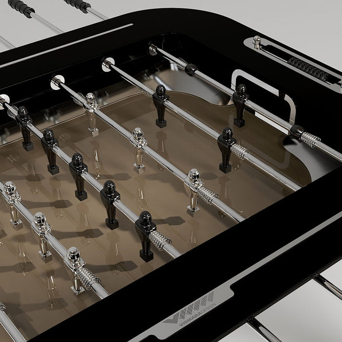 Closeup of the play area on the Stadium Foosball Table, showcasing gold and chrome finishes with intricate details.