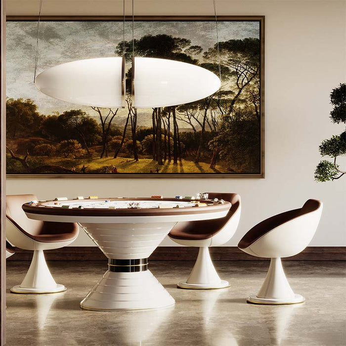 Luxurious round Vismara Vegas poker table with sculptural white base, surrounded by modern leather chairs in an elegant games room setting.