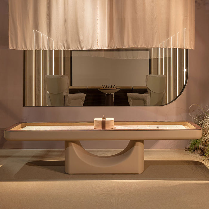 Elegant room setting with the Vismara Flume shuffleboard table in a contemporary living space, minimal décor and soft ambient lighting – luxury leisure furniture.