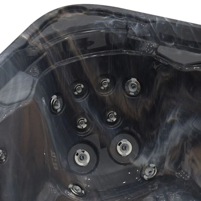 Close-up of hydrotherapy jet layout in Wellis Valencia Hot Tub, showcasing jet strength and massage detail in Midnight Canyon shell.