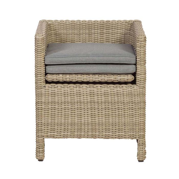 Front view of the compact rattan chair from the Wentworth 10 Seater Cube Dining Set, with stacked grey cushions for space-saving storage.