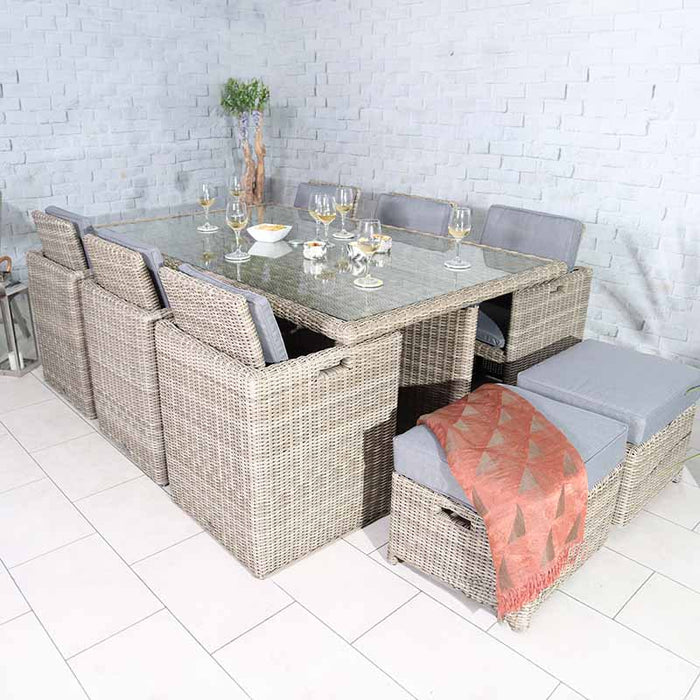 Top view of the Wentworth 10 Seater Cube Dining Set arranged indoors, showcasing the spacious glass-topped table and comfortable rattan seating.