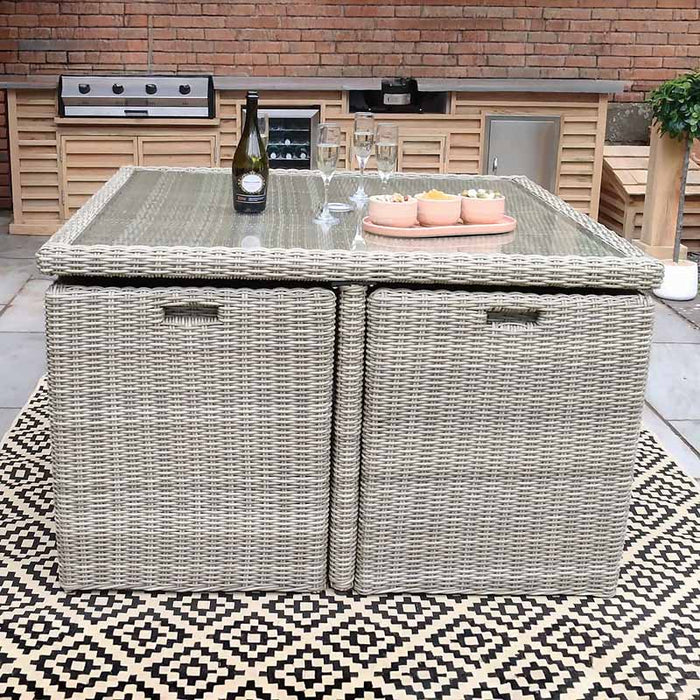 Wentworth 8 Seater Cube Dining Set in a stylish patio, showcasing its versatile cube design and comfortable seating.