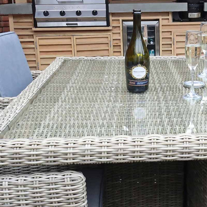 Glass-topped table of the Wentworth 8 Seater Cube Dining Set, ideal for al fresco dining and entertaining.