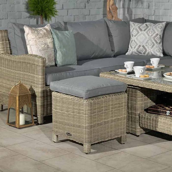 Wentworth 8 Seater Deluxe Corner Dining Set with stool and decorative lantern, highlighting the elegant rattan and soft cushions.