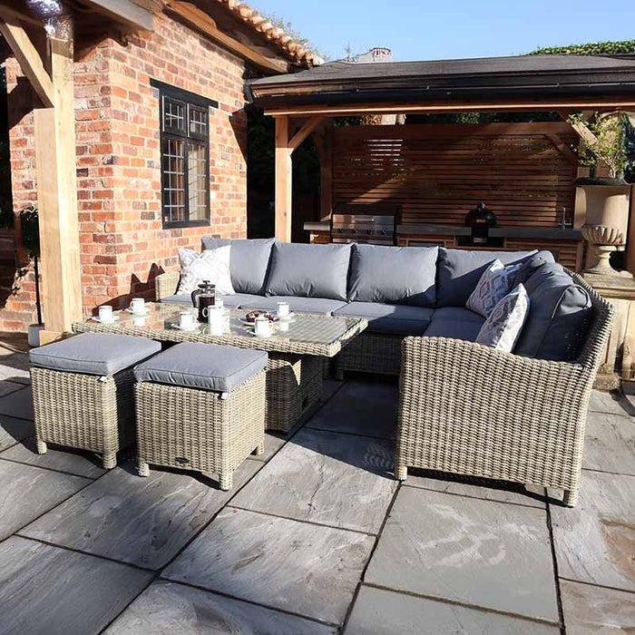 Wentworth 8 Seater Deluxe Corner Dining Set with additional stools, offering ample seating for outdoor entertainment in a beautiful garden setting.