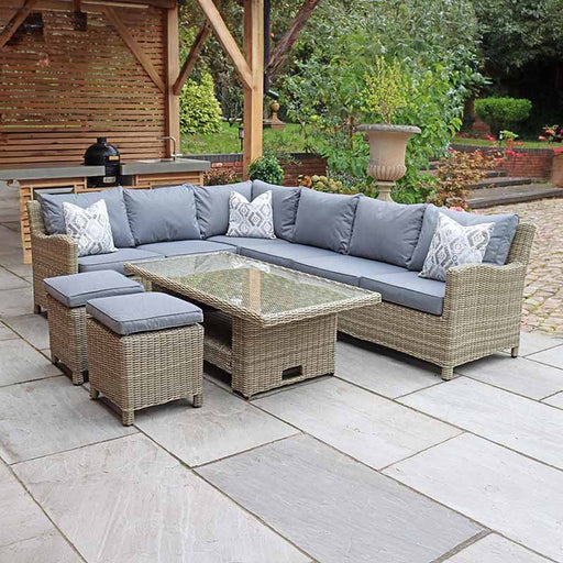 Wentworth 8 Seater Deluxe Corner Dining Set displayed in a serene outdoor environment, combining style and comfort with durable rattan construction.